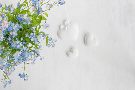 Blue flowers on a light background empty space for your text, top viewの写真素材