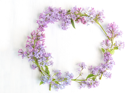 Wreath of lilac branch on a light backgroundの写真素材
