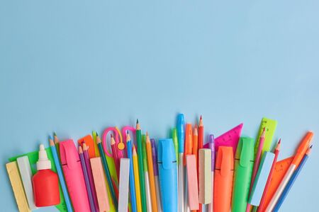 School supplies frame on a blue backgroundの写真素材