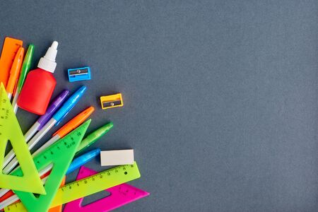 School supplies frame on a dark backgroundの写真素材