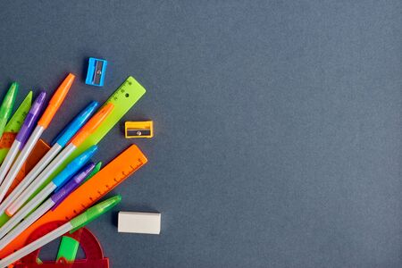 School supplies frame on a dark backgroundの写真素材