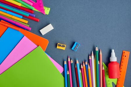School supplies frame on a dark backgroundの写真素材