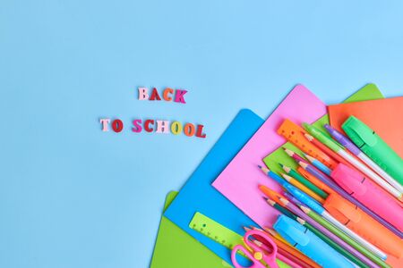 School supplies frame on a blue backgroundの写真素材