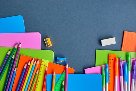 School supplies frame on a dark backgroundの写真素材