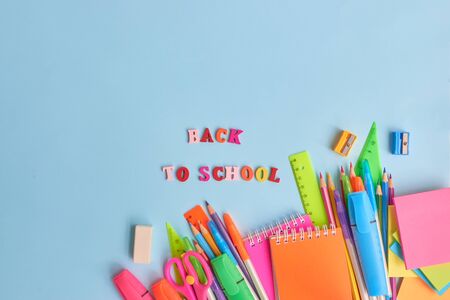 School supplies frame on a blue backgroundの写真素材