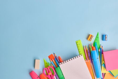 School supplies frame on a blue backgroundの写真素材
