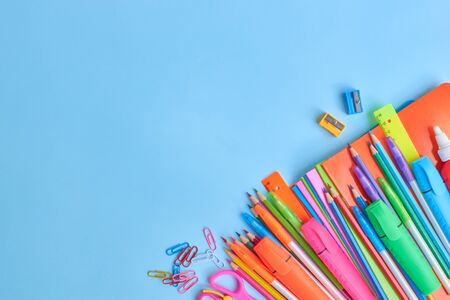 School supplies frame on a blue backgroundの写真素材