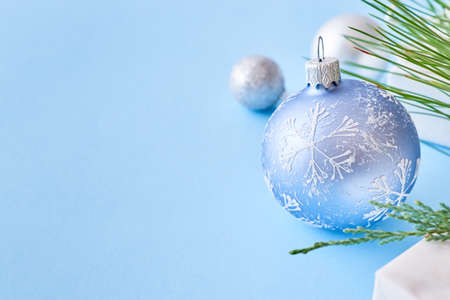 Christmas border with christmas balls on a blue backgroundの写真素材