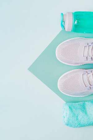 Concept of healthy lifestyle. Flat lay sport shoes, new sneakers on a light backgroundの写真素材
