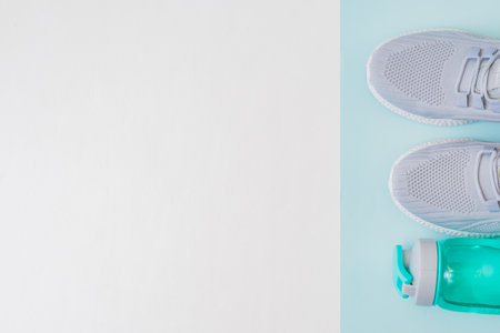 Concept of healthy lifestyle. Flat lay sport shoes, new sneakers on a light backgroundの写真素材