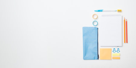 Flat lay school and office supplies on a white backgroundの写真素材