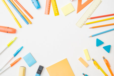 Flat lay school and office supplies on a white background