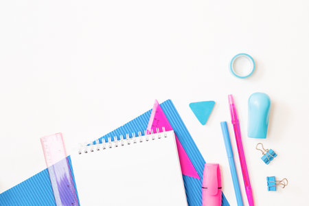 Flat lay school and office supplies on a white background