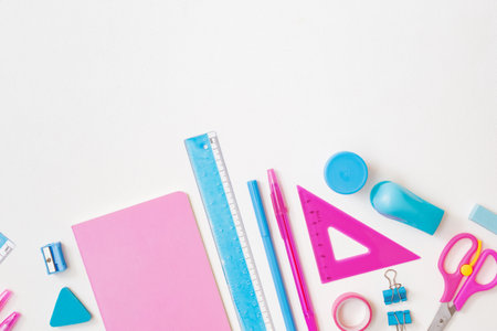 Flat lay school and office supplies on a white backgroundの写真素材