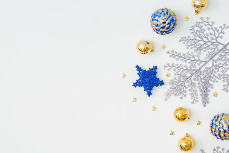 Flat lay frame with christmas balls on a white background. Merry christmas card and copy space for your textの写真素材