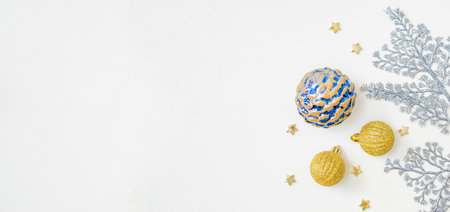 Flat lay frame with christmas balls on a white background. Christmas and New Year banner with copy space for your textの写真素材