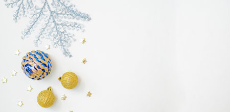 Flat lay frame with christmas balls on a white background. Christmas and New Year banner with copy space for your textの写真素材