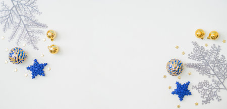 Flat lay frame with christmas balls on a white background. Christmas and New Year banner with copy space for your textの写真素材