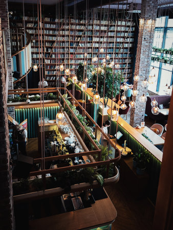 Interior of a cafe with tables and chairs in loft style.の写真素材