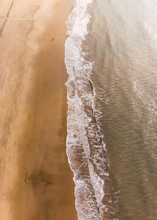 cenital view of a white sand beachの写真素材