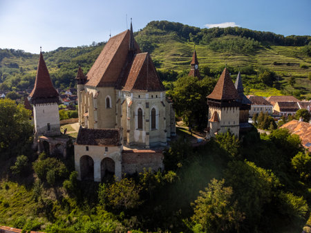 Drone view of a Medieval Fortified Church of Biertan in a sunny day of summer in Romaniaの写真素材