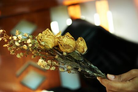 Wedding bouquet in hands of bride and groomの写真素材