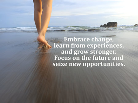 Life inspirational quote - embrace change, learn from experiences, and grow stronger. Focus on the future and seize new opportunities. With bare feet of person walking on beach.の写真素材
