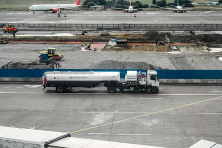 Moscow, Russia, August 14 2020. A truck with fuel drives along the construction site at Domodedovo airportのeditorial素材