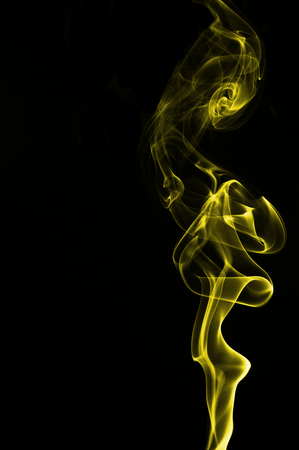Capturing the smoke from an incense stick and changing the coloursの写真素材