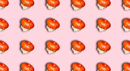 Pattern for Halloween with pumpkins with unusual shapes on a pink background. Pattern, print.の写真素材