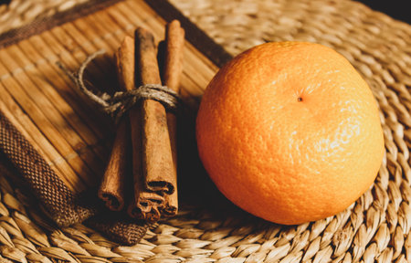Close-up of cinnamon sticks tied with a string. Selective shot.の写真素材
