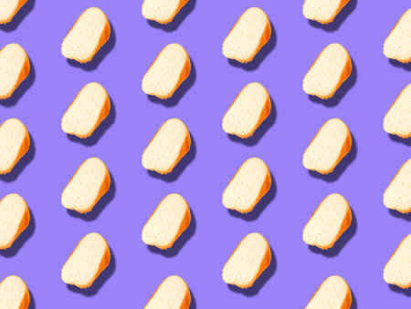 Pattern with slices of sliced white bread with a shadow. The levitation effect. Prints, copy space.の写真素材