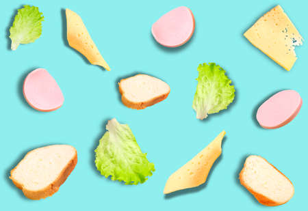 A pattern of different ingredients for making sandwiches on a blue background. Grocery background, prints.の写真素材