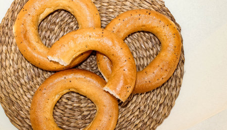 Bagels with poppy seeds on the table. Top view.