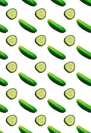 Vertical pattern with different fresh cucumbers on a white background. Vegetable background. Patterns, prints.の写真素材