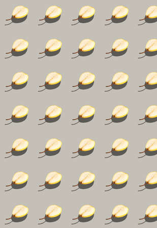Vertical pattern with a fresh pear cut in half. Fruit template.