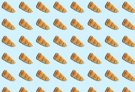A pattern of a sweet cake with cream in the shape of tubes. Prints, templates.の写真素材