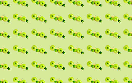 A pattern with fruits and vegetables on a green background. The food diet template. Prints, templates.の写真素材