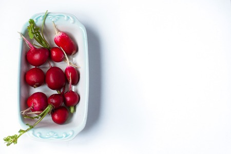 red radishes on white background.の写真素材