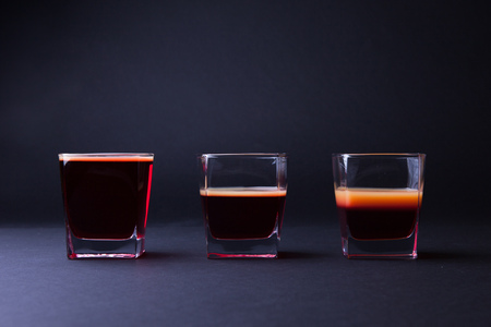 Glasses with a drink on a gray backgroundの写真素材