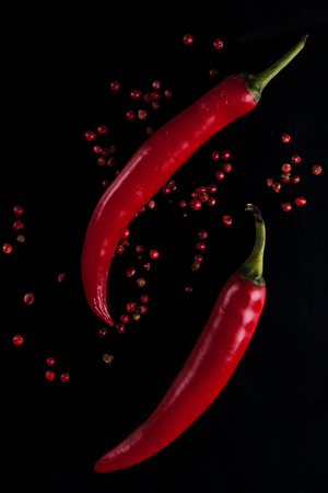 Red chili pepper on a black backgroundの写真素材
