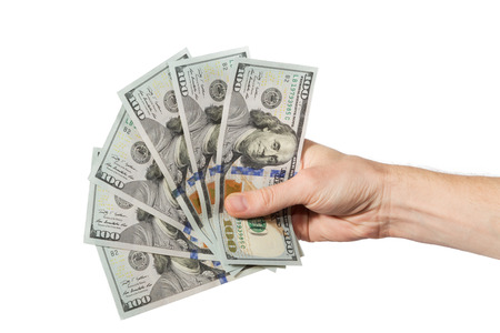 Hand with money on a white background の写真素材