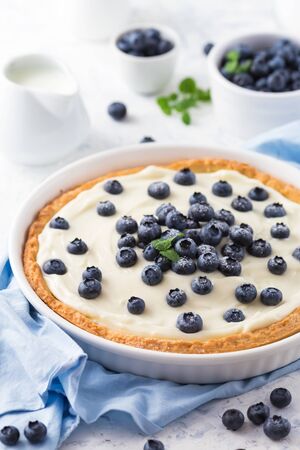 Blueberry tart with whipped creamの写真素材