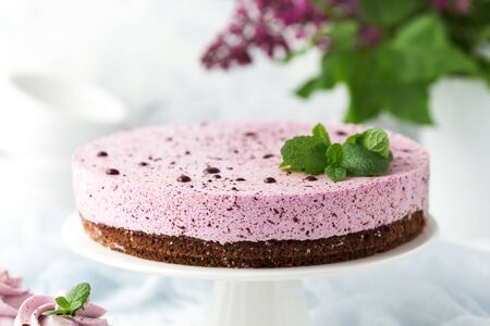 Vegan blueberry cake with chocolate brownie