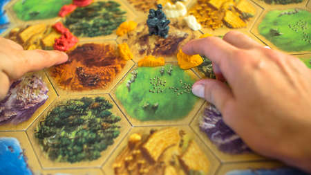 The robber in the Settlers of Catan board game. Katana board game. Game for family. Russia /...