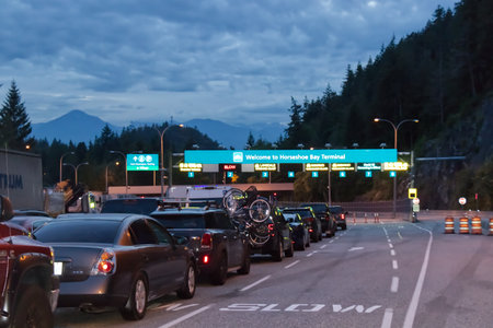Vancouver, Canada - July 16, 2020: Horseshoe Bay Terminal with cars lining up to board BC ferries during Covid-19 pandemicのeditorial素材