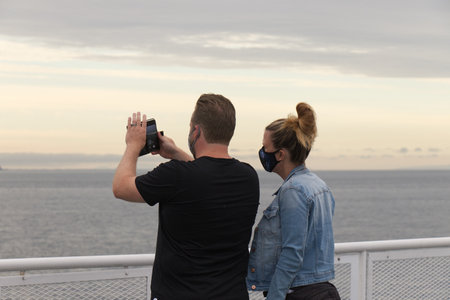 Vancouver, Canada - July 16, 2020: Passengers are wearing face masks on BC Ferries route between Vancouver and Nanaimoのeditorial素材