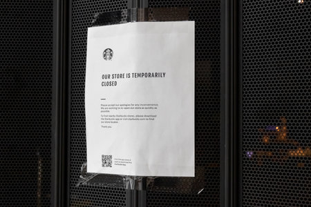 Nanaimo, Canada - September 30,2020: View of sign Our store in temporarily closed at the entrance of...