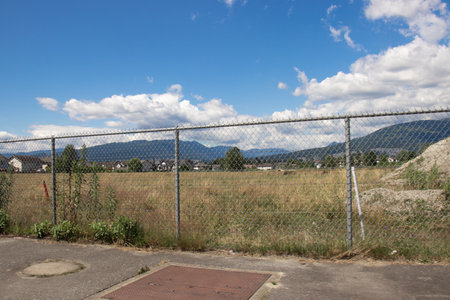 Port Coquitlam, Canada - July 13,2020: Robert William "Willy" Pickton's(canadian serial killer) property(farm) surrounded by high fenceのeditorial素材
