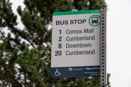 Courtenay, Canada - November 21,2020: View of Bus Stop sign with list of all available busesのeditorial素材